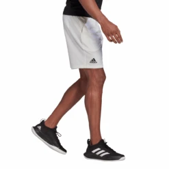 Adidas Men's Club Stretch Woven 7-Inch Shorts (White/Black) -Racquet Guys Shop GH7222 APP on model walking white