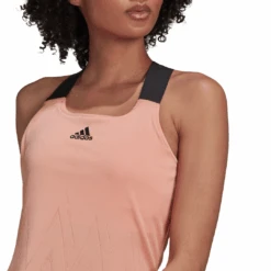 Adidas Women's Tennis Primeblue Aeroknit Y-Tank Top (Ambient Blush) -Racquet Guys Shop H31426 APP on model detail 1 white