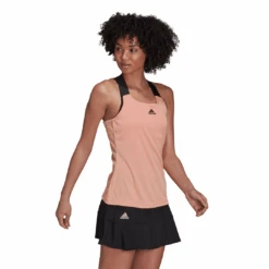 Adidas Women's Tennis Primeblue Aeroknit Y-Tank Top (Ambient Blush) -Racquet Guys Shop H31426 APP on model walking white